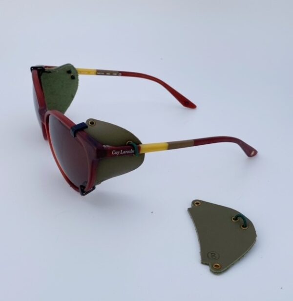 Protectores laterales extraíbles de tono verde oscuro puestas en gafas de sol. Nuestros Side shields sirven para todos los modelos.