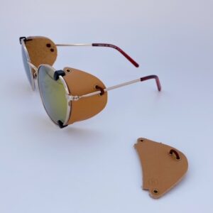 Removable side shields in light color, put on sunglasses. Fits all models.